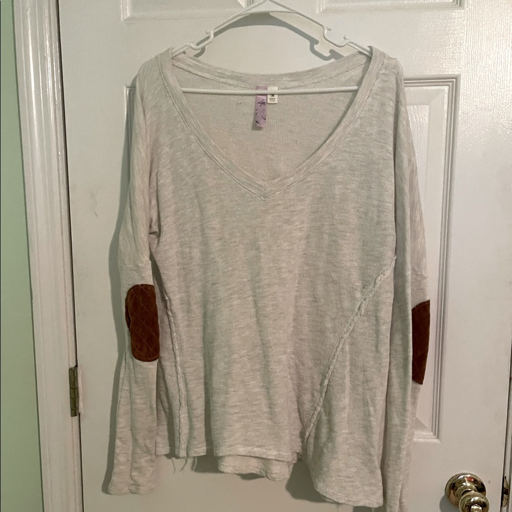 V-Neck loose fitting shirt with elbow patches